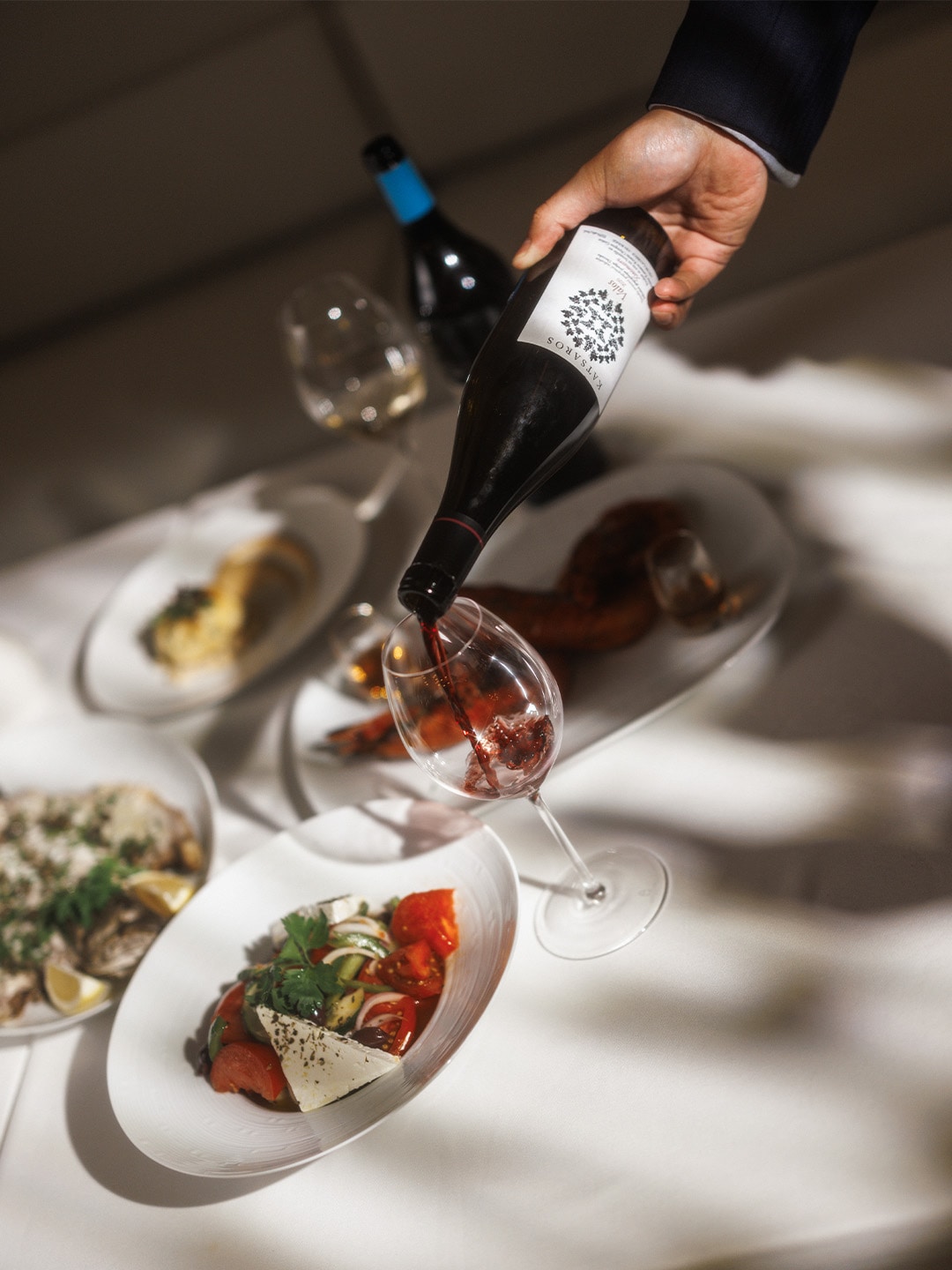 Red wine pairing with Greek cuisine at Milos, a wine bar in Singapore