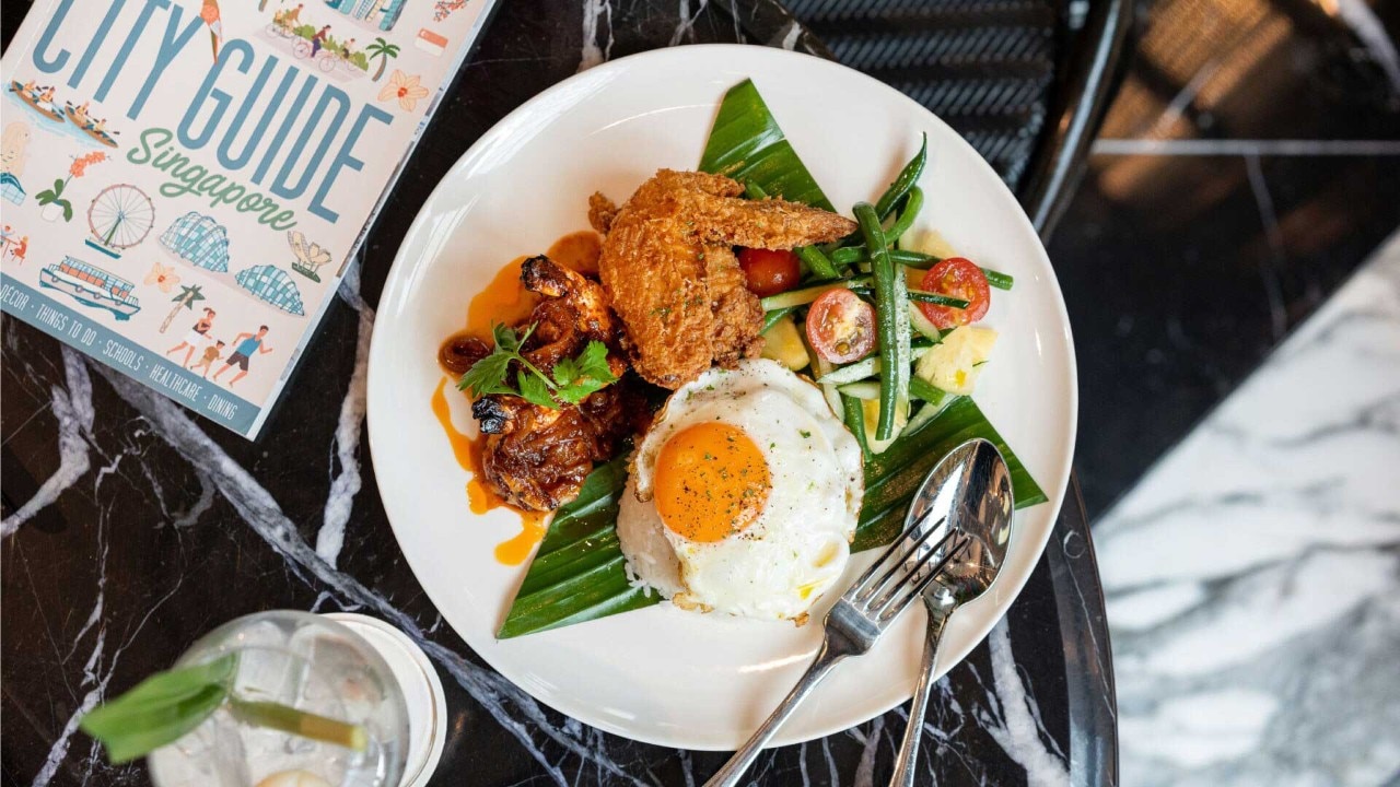 Rice and wings topped with egg at PS. Cafe, serving the best local food in Singapore