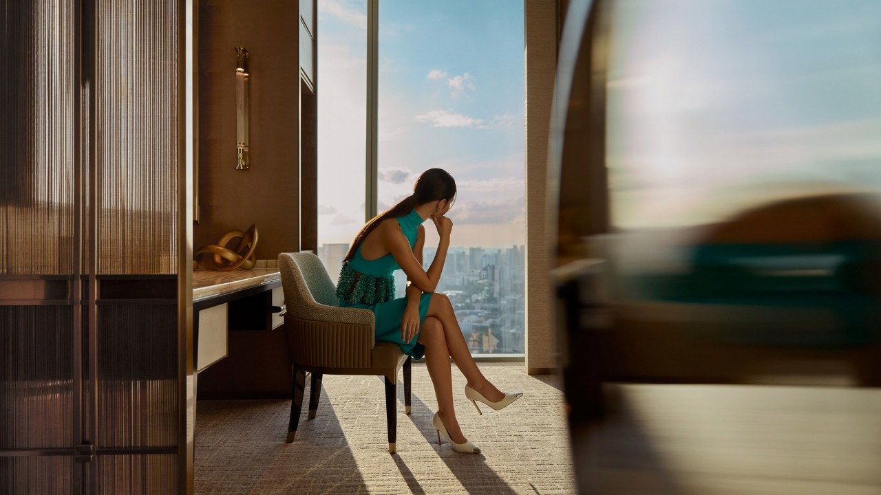 Couple having drinks in a suite