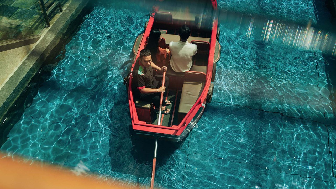 Couple on Sampan Ride at The Shoppes