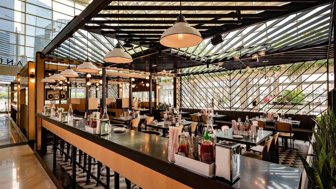 Atrium dining area of Black Tap, a restaurant suitable for private dining and events in Singapore